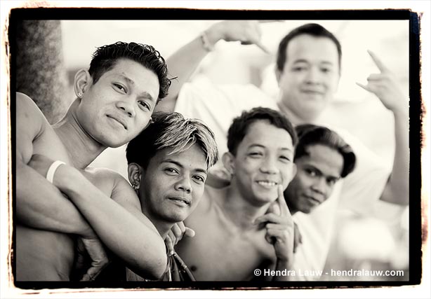 Young men at the Manila North Cemetery