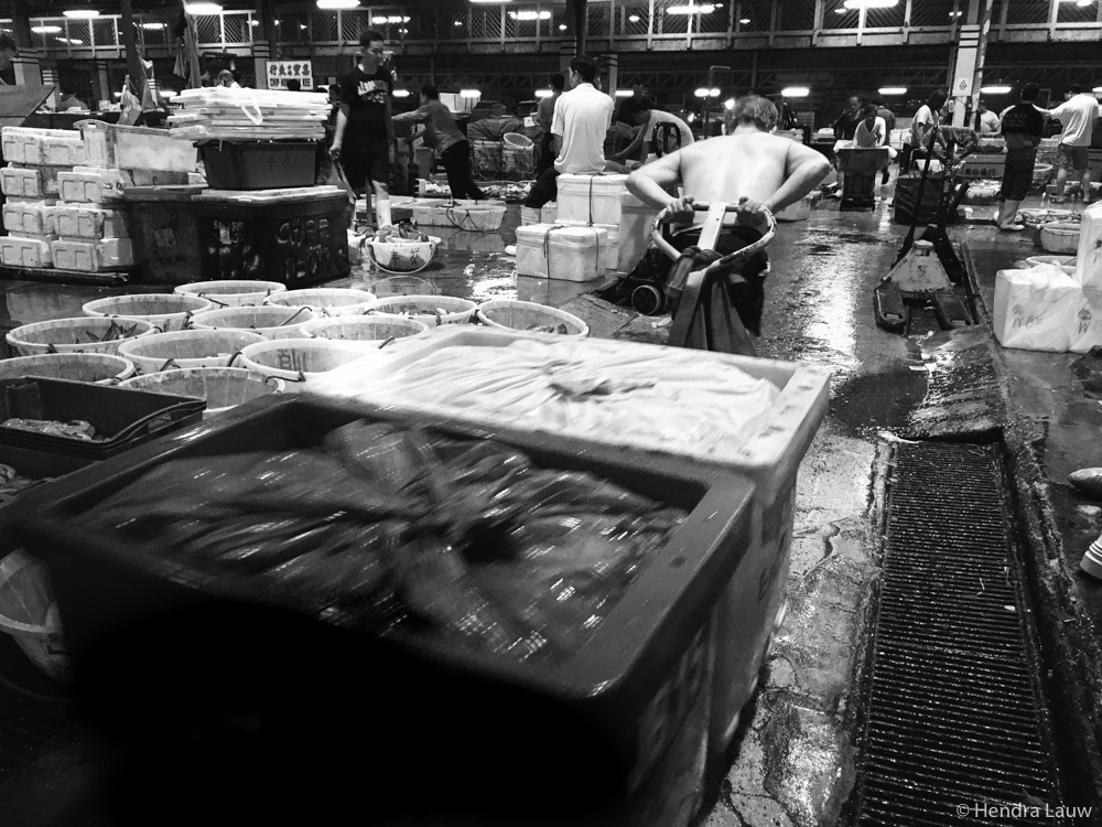 A man pulling cart at Jurong Fishery Port in Singapore