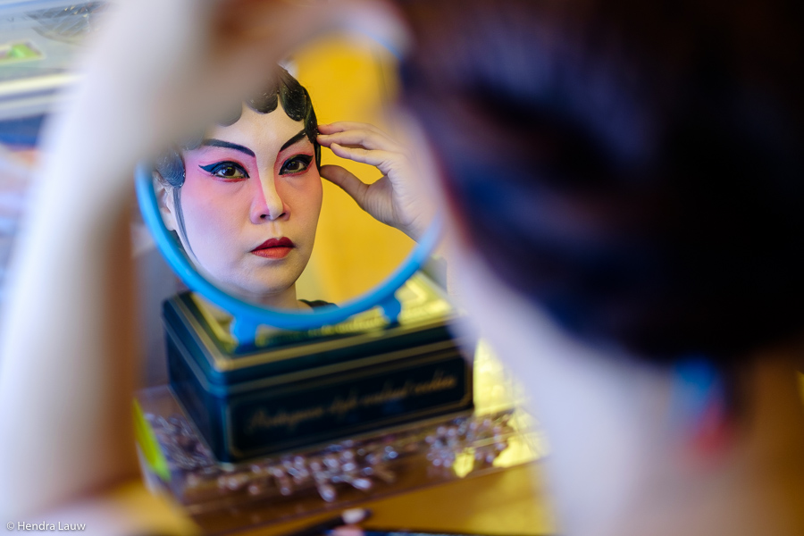 A teochew opera artist getting ready backstage.