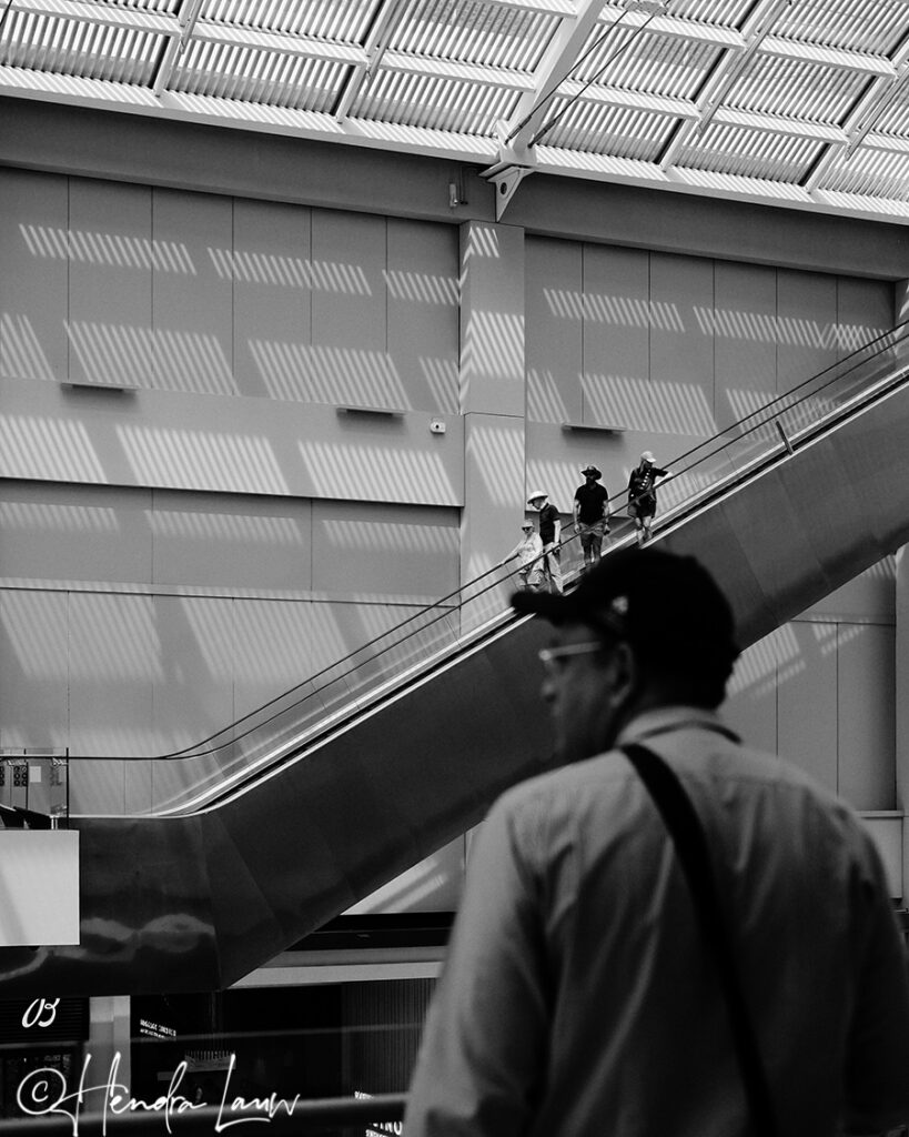 Shadow, highlight, lines and human interest in black and white photography